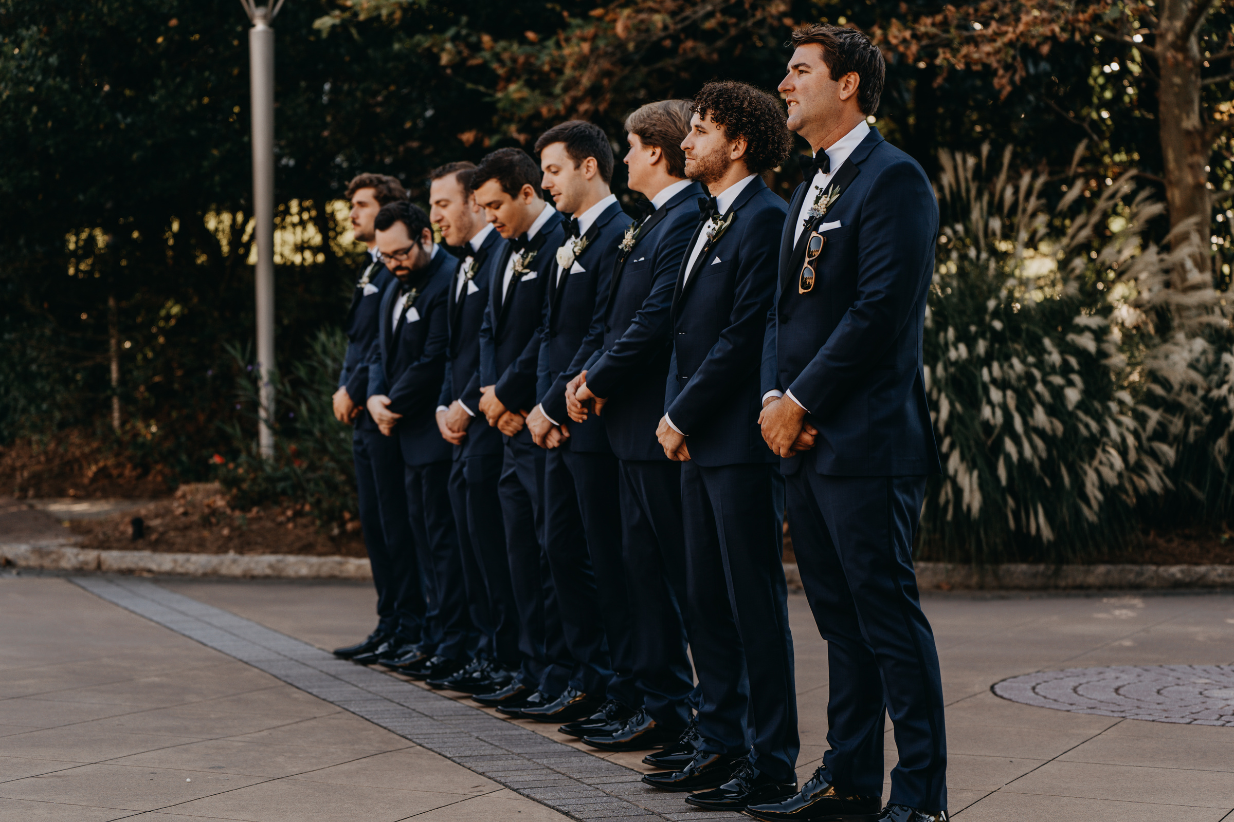 Men Wearing Black Suit Jacket